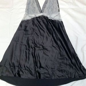 Black satin dress with white lace detailing